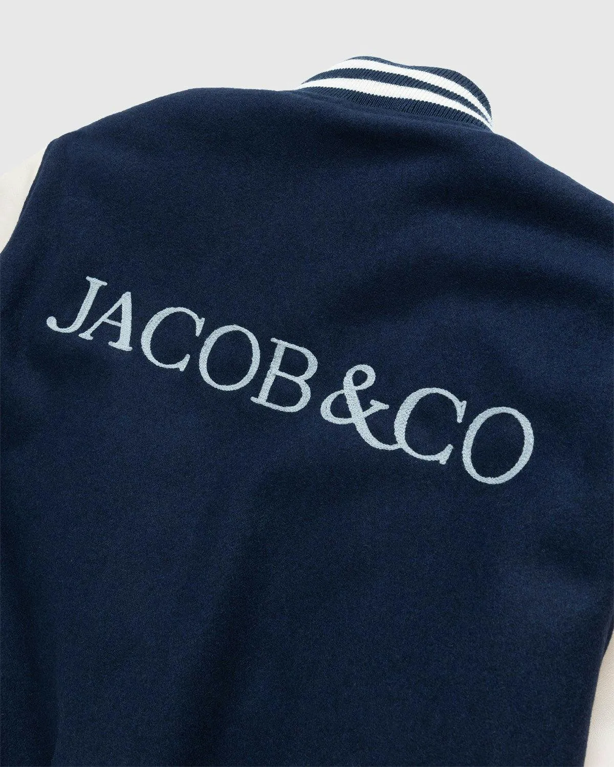 Jacob & Co. x Highsnobiety – Logo Varsity Jacket Navy Creme | Highsnobiety Shop